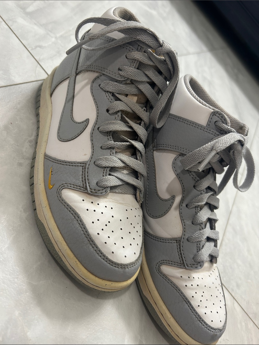 Nike Women’s Gray, White & Gold high-Top Sneakers